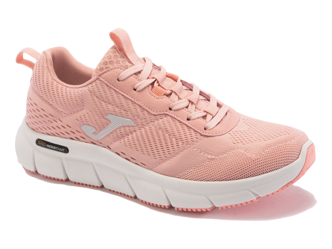Tenis deportivos Joma color rosa con suela blanca para mujer.