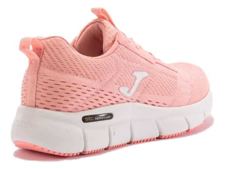 Tenis deportivos Joma color rosa con suela blanca para mujer.