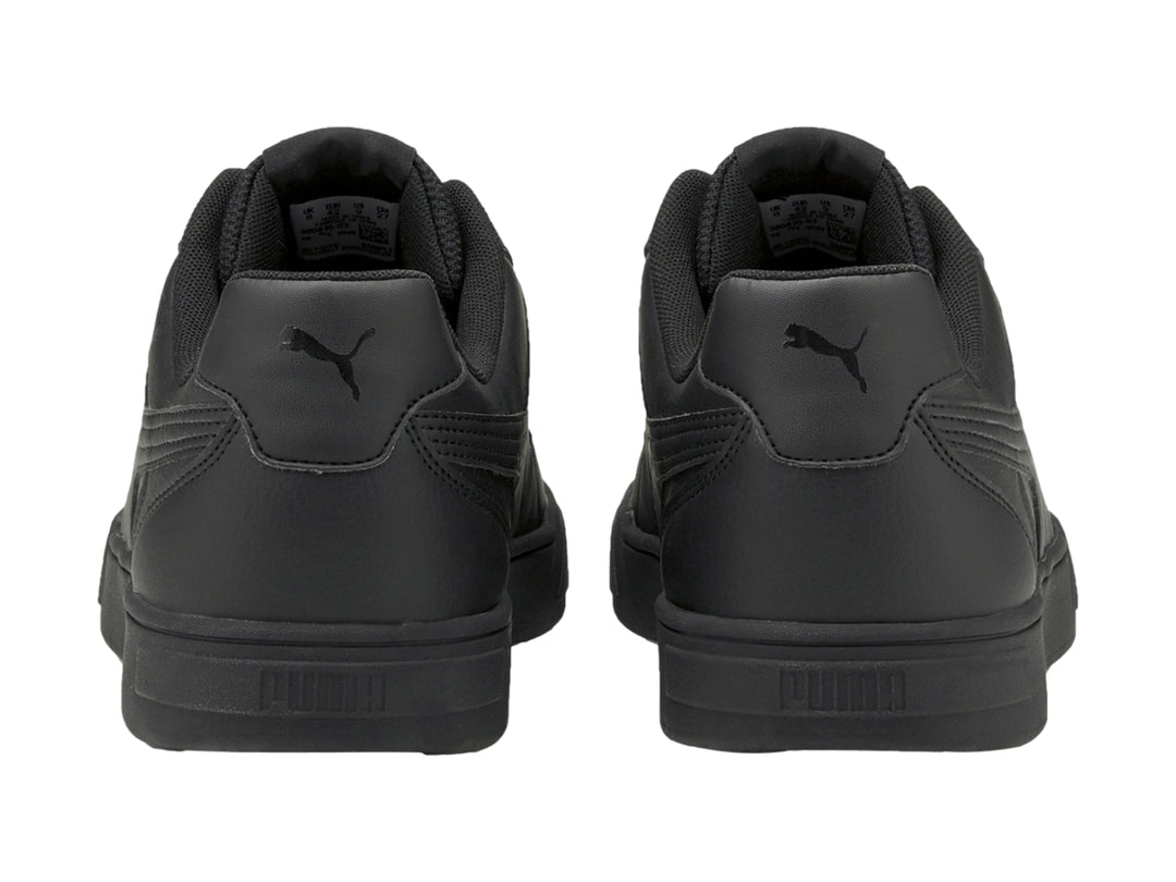Tenis PUMA Caven color negro total, vista lateral sobre fondo blanco.