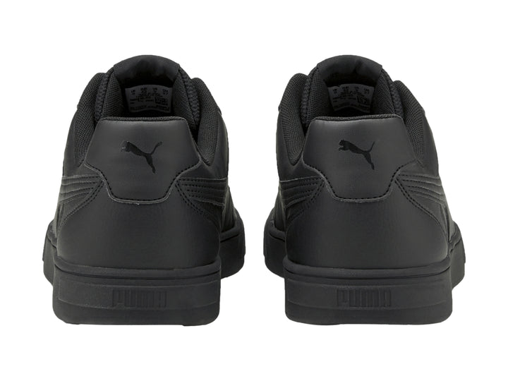 Tenis PUMA Caven color negro total, vista lateral sobre fondo blanco.