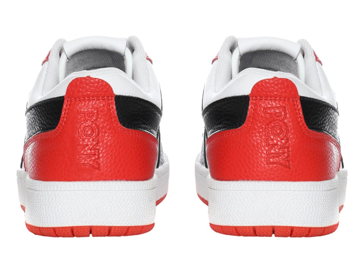 Tenis deportivos PONY en colores blanco, negro y rojo con suela roja y cordones rojos.