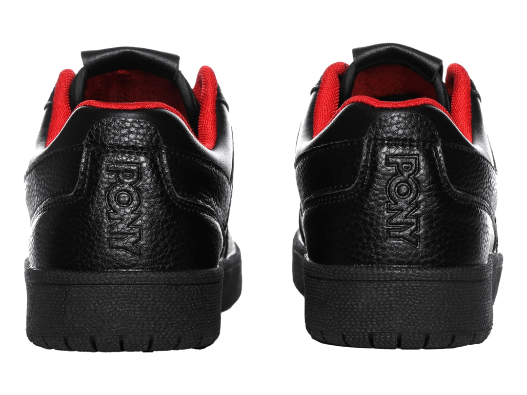 Tenis PONY color negro con interior rojo, diseño deportivo de corte bajo y suela gruesa.