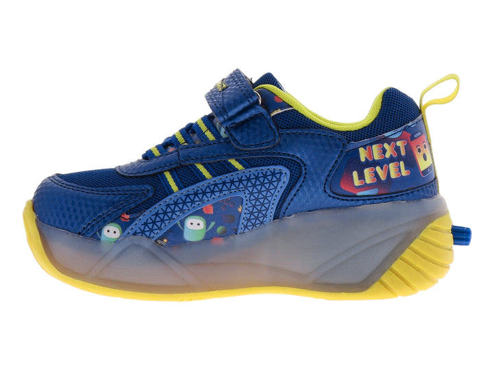 Tenis deportivos infantiles color azul y amarillo con detalles multicolores y suela gris translúcida.