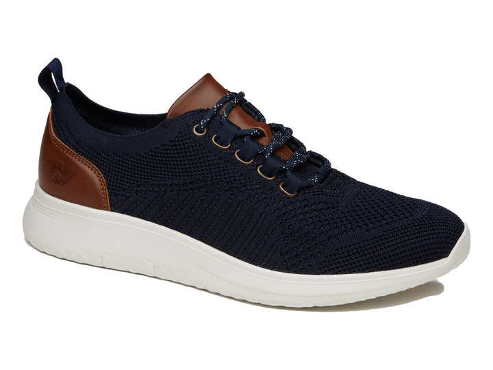 Zapato casual Dockers color marino con detalles en café y suela blanca.