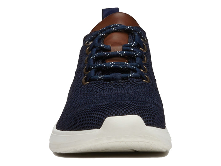 Zapato casual Dockers color marino con detalles en café y suela blanca.