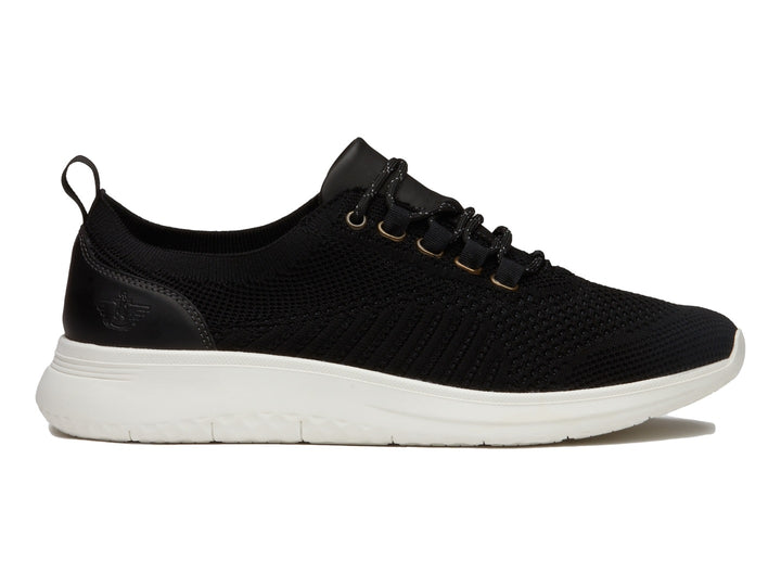 Zapato casual Dockers color negro con suela blanca y tejido transpirable.