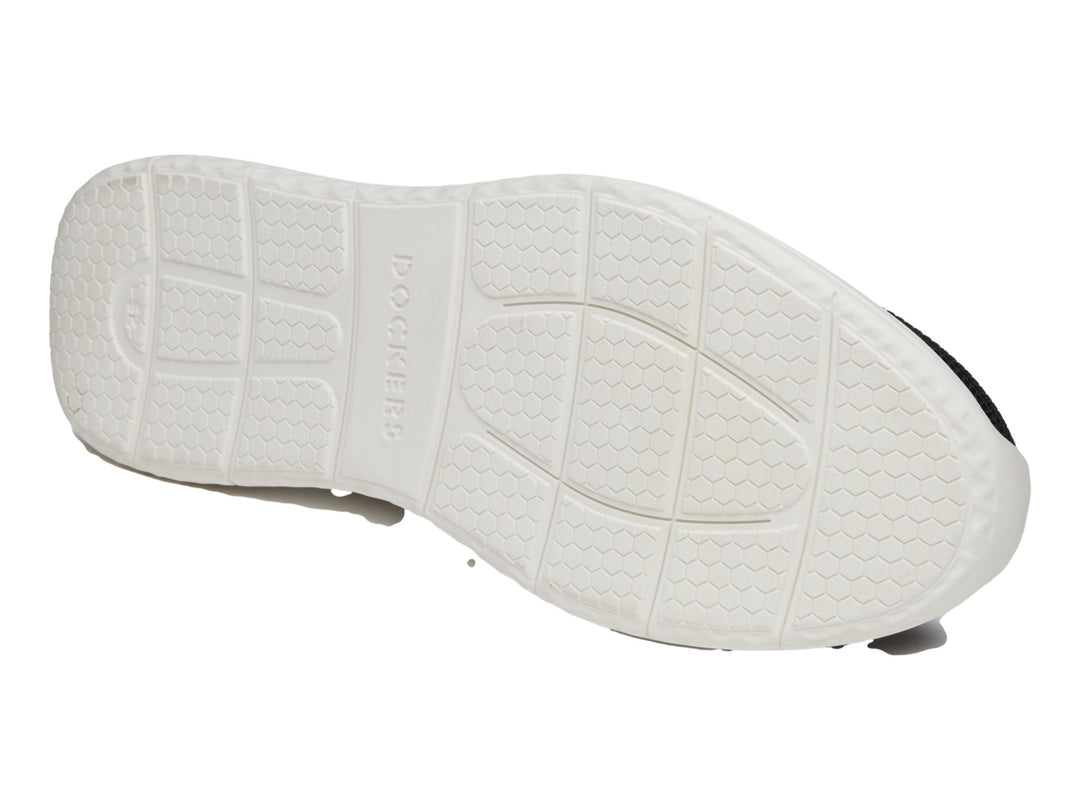 Zapato casual Dockers color negro con suela blanca y tejido transpirable.