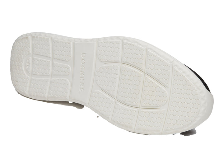 Zapato casual Dockers color negro con suela blanca y tejido transpirable.