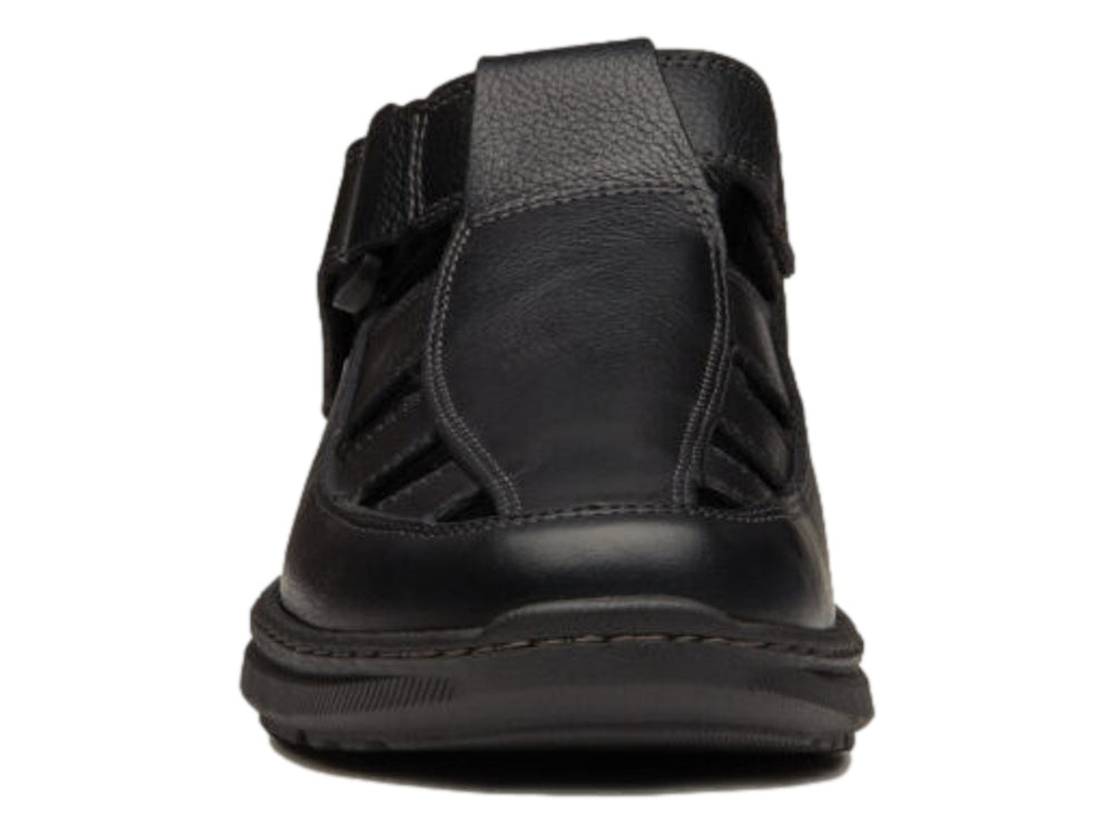 Zapato sandalia Dockers color negro de cuero con aberturas laterales y frontales.