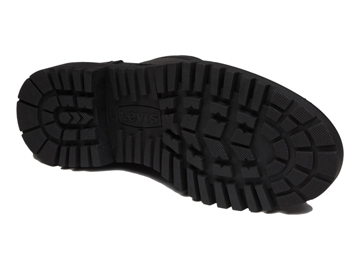 Bota negra de material sintético con cordones y suela track gruesa.