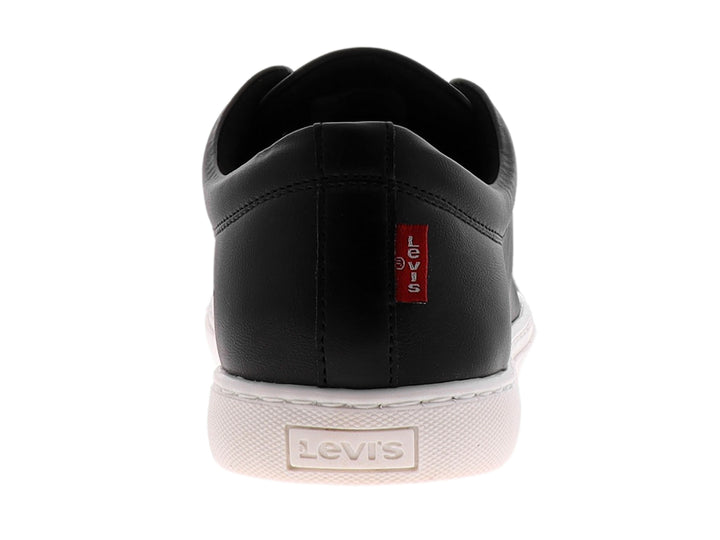 Tenis casuales color negro con suela blanca y agujetas negras.