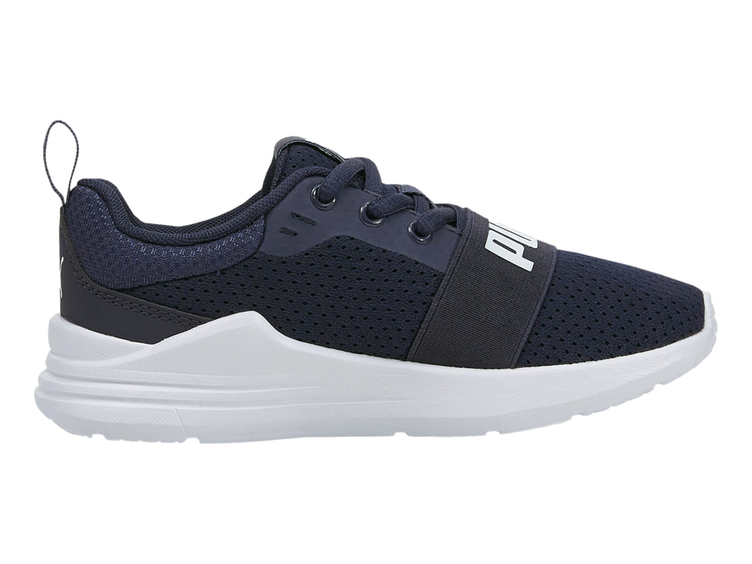 Tenis PUMA Wired Run para niño en color azul marino con suela blanca.
