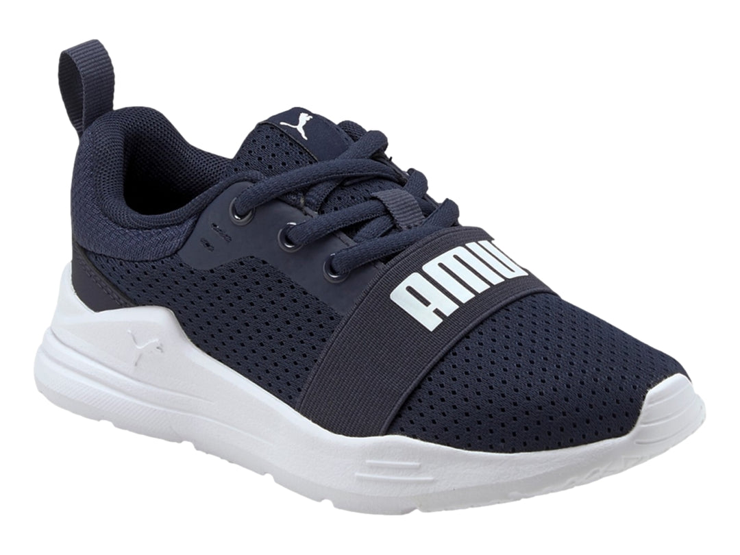 Tenis PUMA Wired Run para niño en color azul marino con suela blanca.