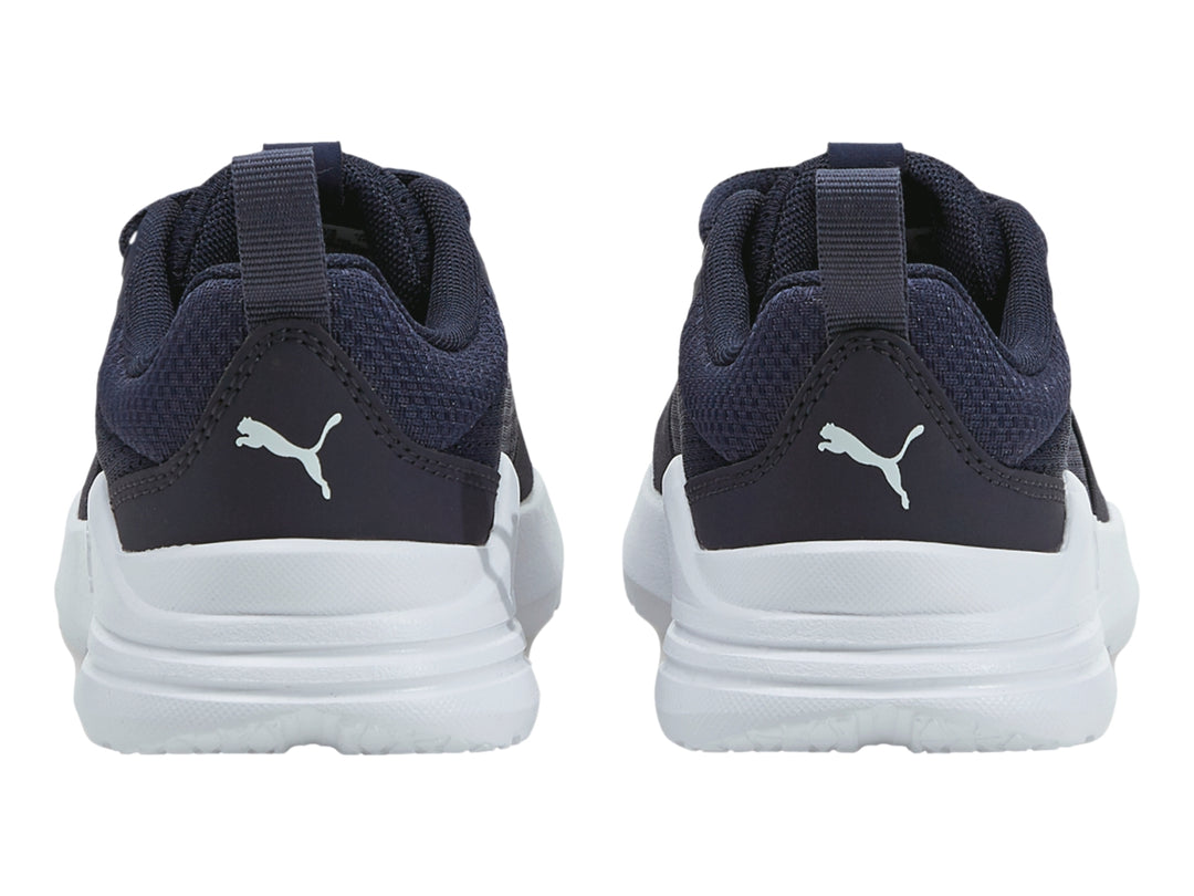 Tenis PUMA Wired Run para niño en color azul marino con suela blanca.