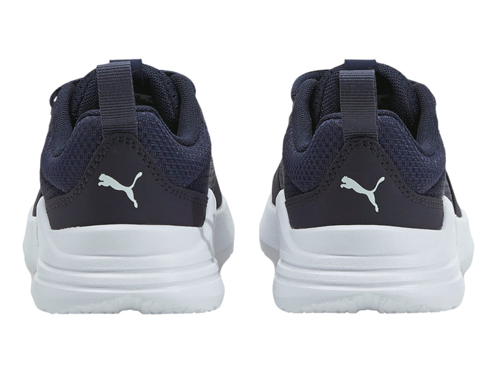Tenis PUMA Wired Run para niño en color azul marino con suela blanca.