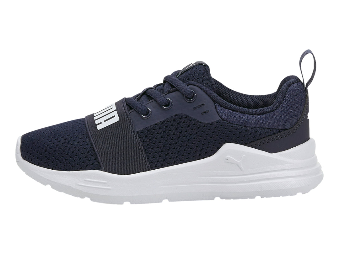 Tenis PUMA Wired Run para niño en color azul marino con suela blanca.