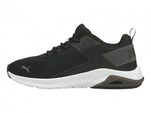 Tenis deportivos PUMA en color negro con suela blanca y detalles en gris.