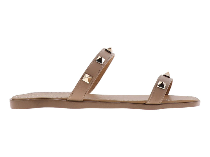Sandalias planas color beige con tachuelas doradas para niña.