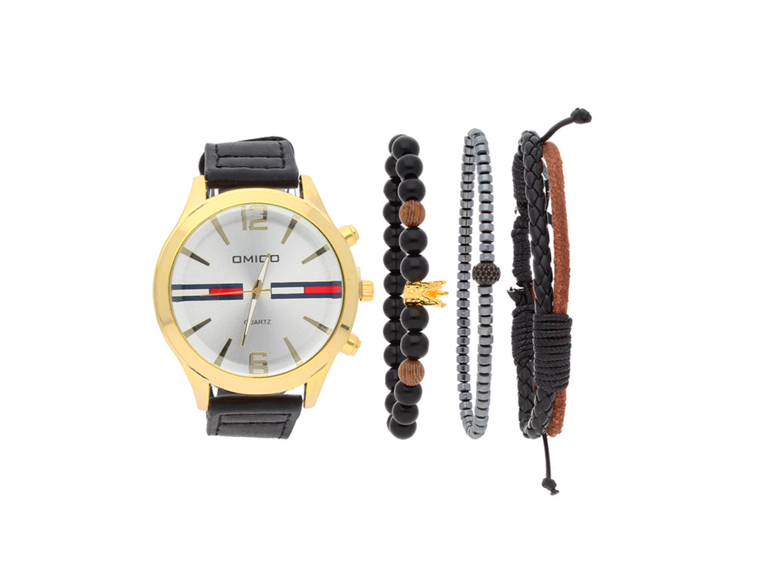 Set de reloj con correa negra y caja dorada acompañado de tres pulseras coordinadas sobre fondo blanco.
