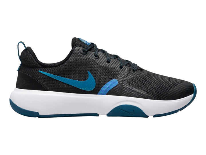 Tenis deportivos Nike color negro con suela blanca y detalles en azul marino.