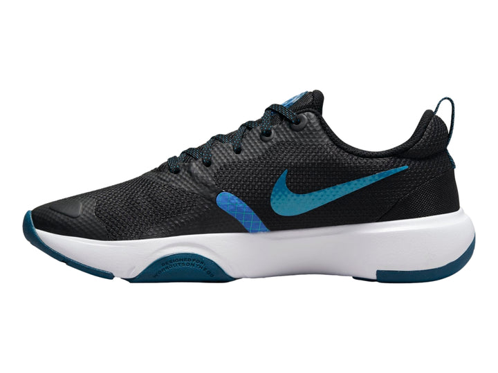 Tenis deportivos Nike color negro con suela blanca y detalles en azul marino.
