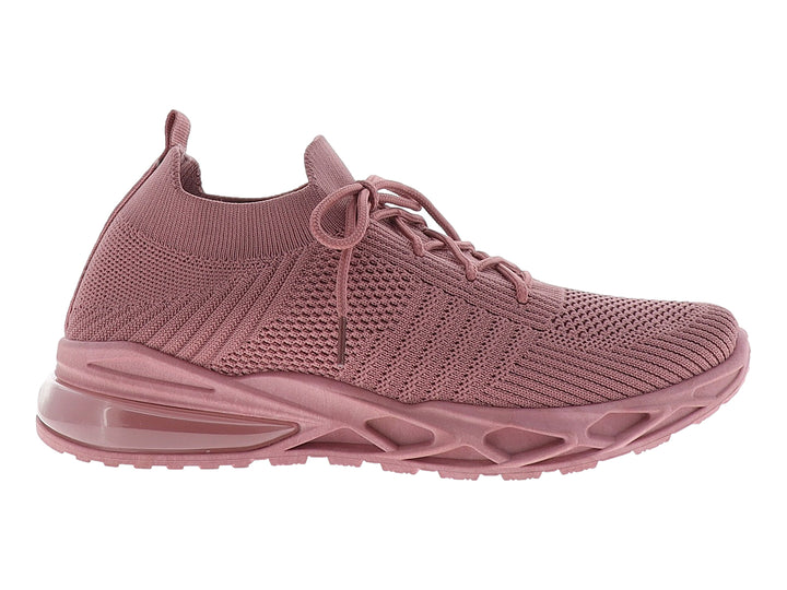 Tenis deportivos para mujer en color rosa con tejido transpirable y suela gruesa.