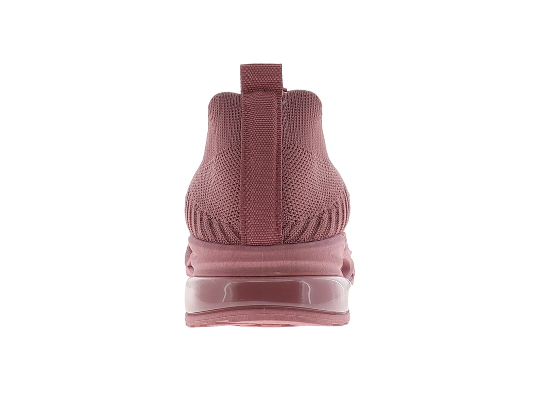 Tenis deportivos para mujer en color rosa con tejido transpirable y suela gruesa.