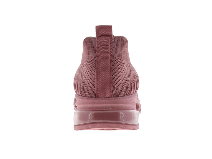 Tenis deportivos para mujer en color rosa con tejido transpirable y suela gruesa.
