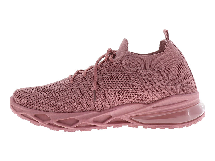 Tenis deportivos para mujer en color rosa con tejido transpirable y suela gruesa.
