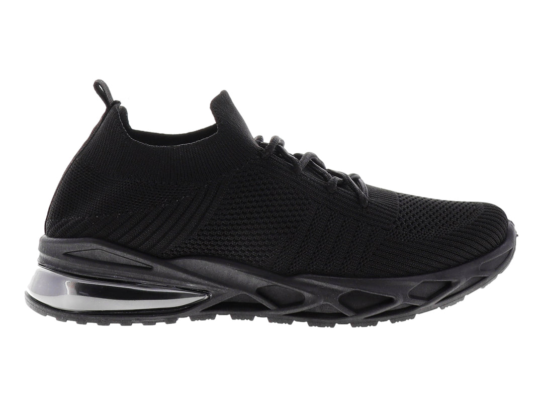 Tenis deportivos color negro con suela gruesa y tejido transpirable.