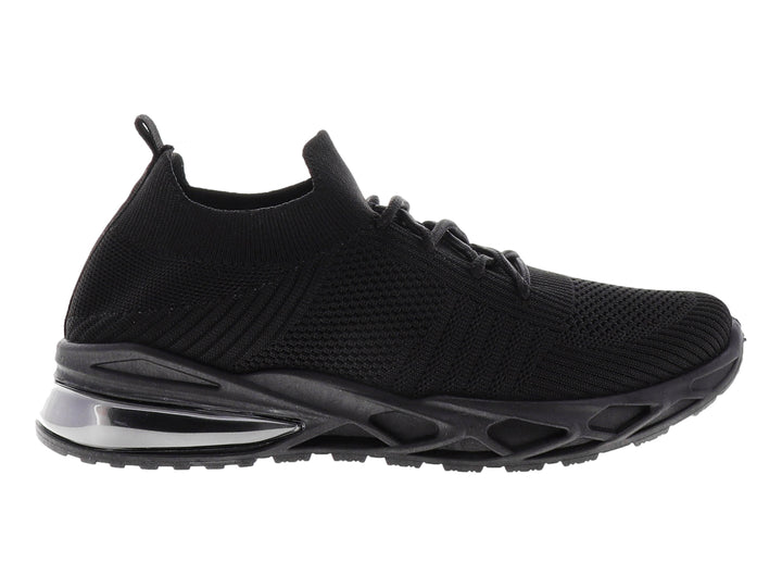 Tenis deportivos color negro con suela gruesa y tejido transpirable.