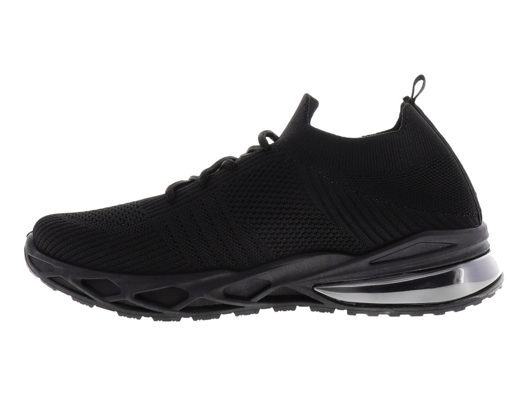 Tenis deportivos color negro con suela gruesa y tejido transpirable.