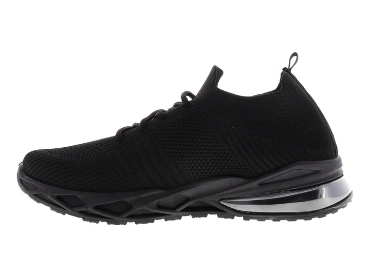 Tenis deportivos color negro con suela gruesa y tejido transpirable.
