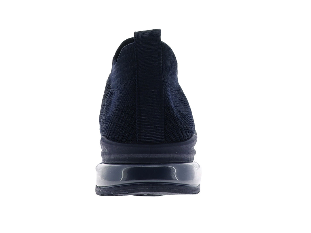 Tenis deportivos color azul marino con diseño de tejido y suela gruesa con cámara de aire.