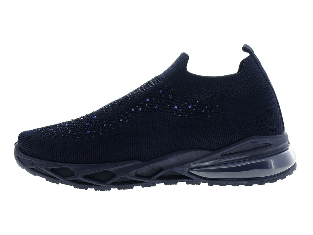 Tenis deportivos color azul marino con diseño de tejido y suela gruesa con cámara de aire.