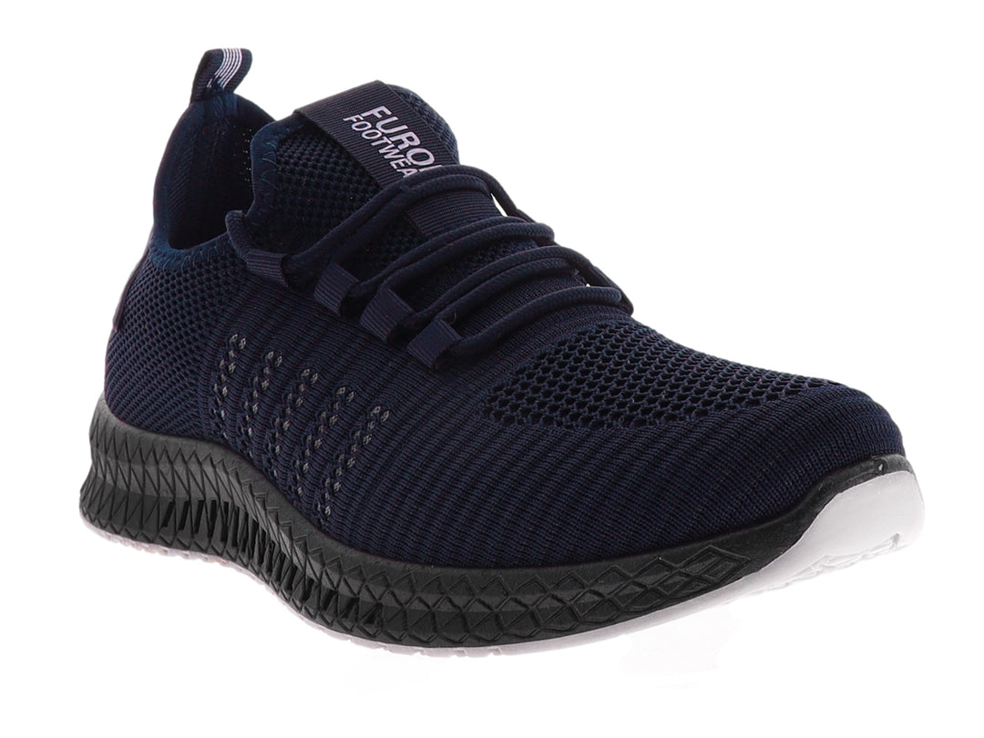 Tenis deportivos Furor color azul marino con suela negra texturizada para hombre.