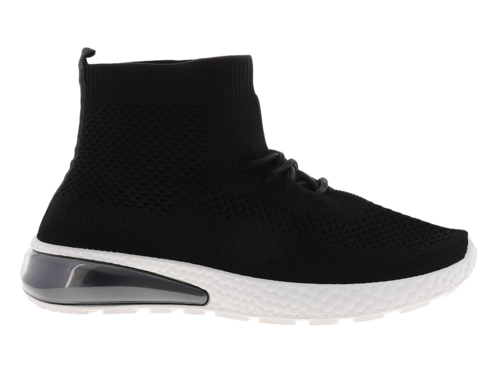 Tenis deportivos negros estilo calcetín con suela blanca y cámara de aire en el talón.