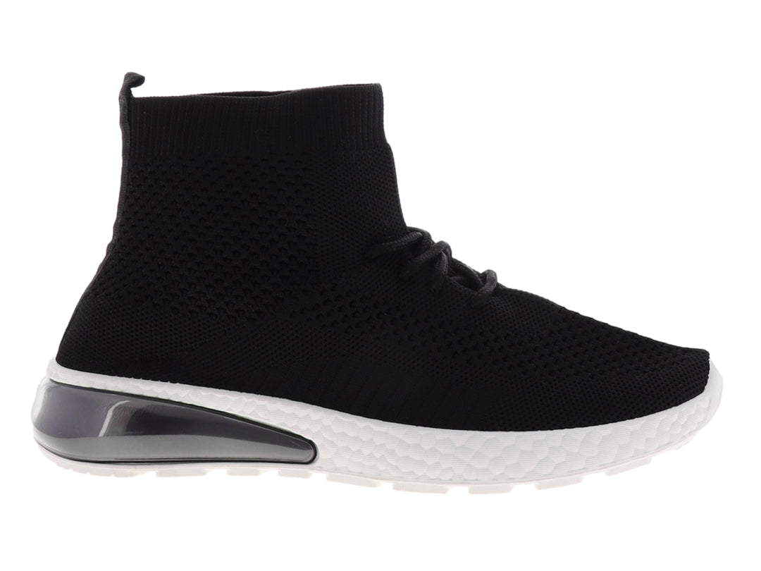 Tenis deportivos negros estilo calcetín con suela blanca y cámara de aire en el talón.