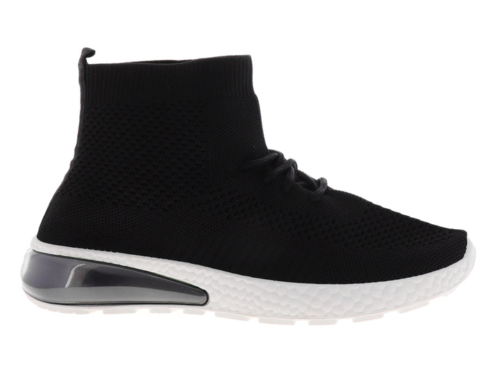 Tenis deportivos negros estilo calcetín con suela blanca y cámara de aire en el talón.