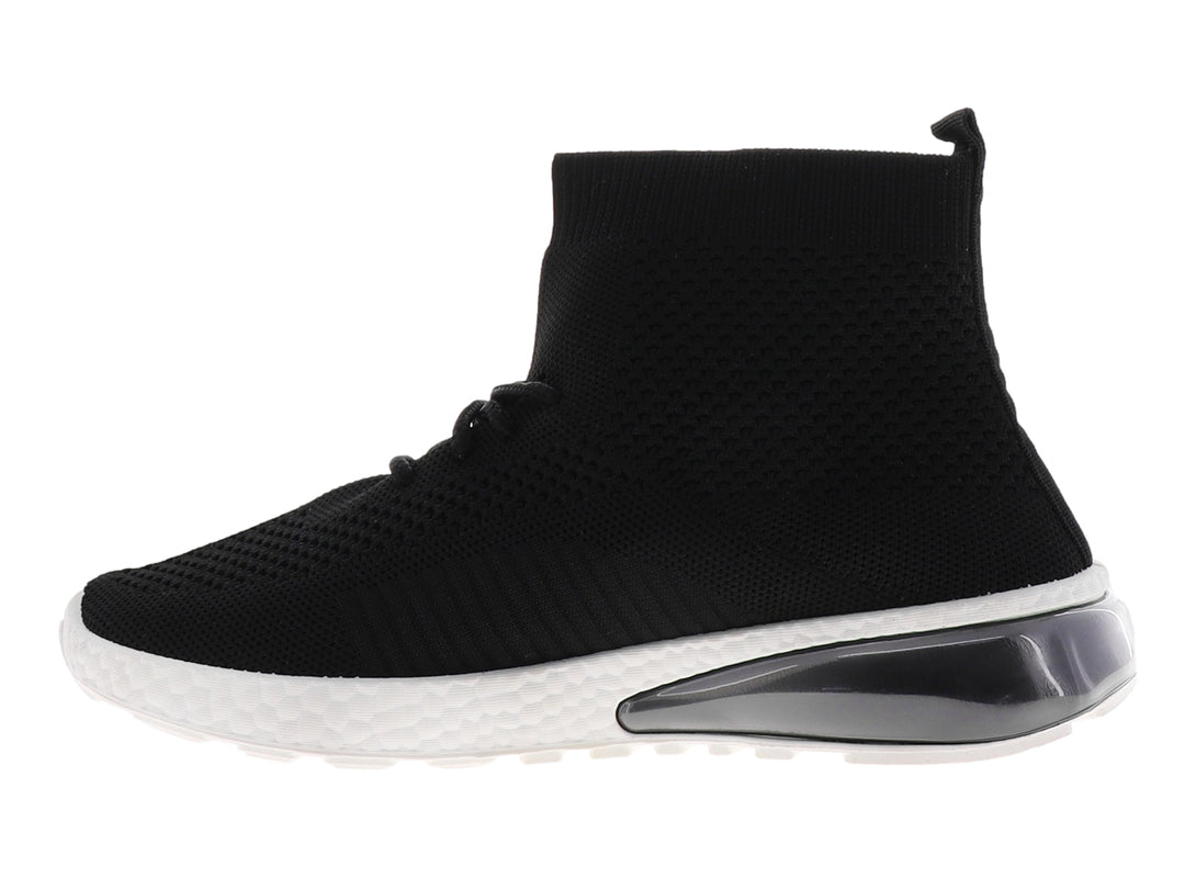 Tenis deportivos negros estilo calcetín con suela blanca y cámara de aire en el talón.