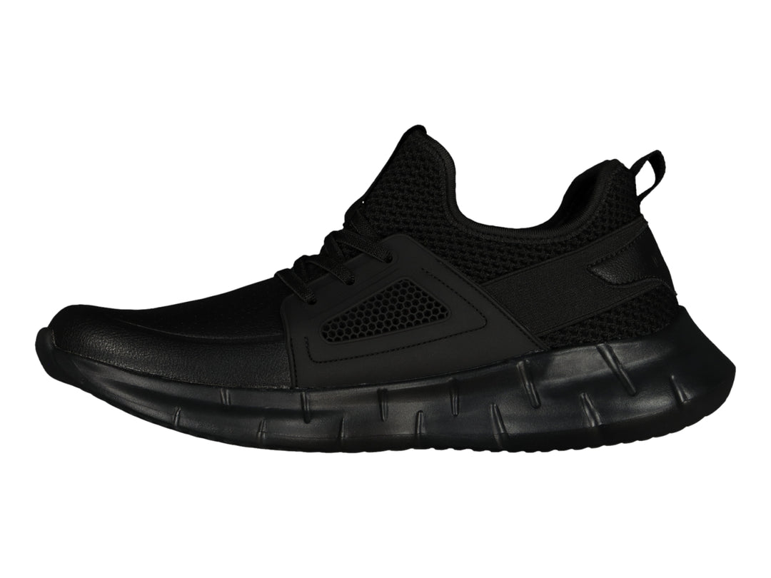 Tenis deportivos Charly color negro con detalles de malla y suela robusta.