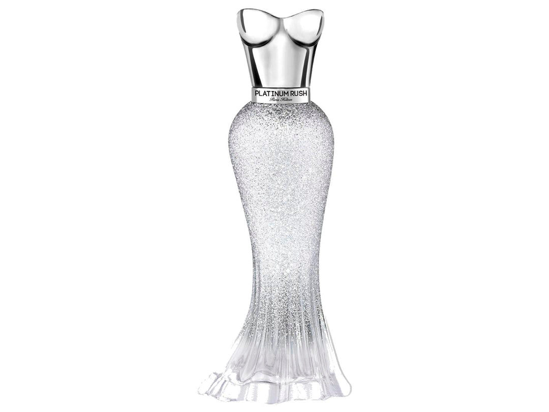 Set de belleza Paris Hilton Platinum Rush con perfume, maquillaje y accesorios en estuche plateado.