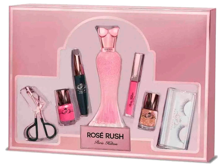 Set de regalo Paris Hilton Rosé Rush que incluye perfume, esmaltes, rímel, gloss y pestañas en estuche rosa.