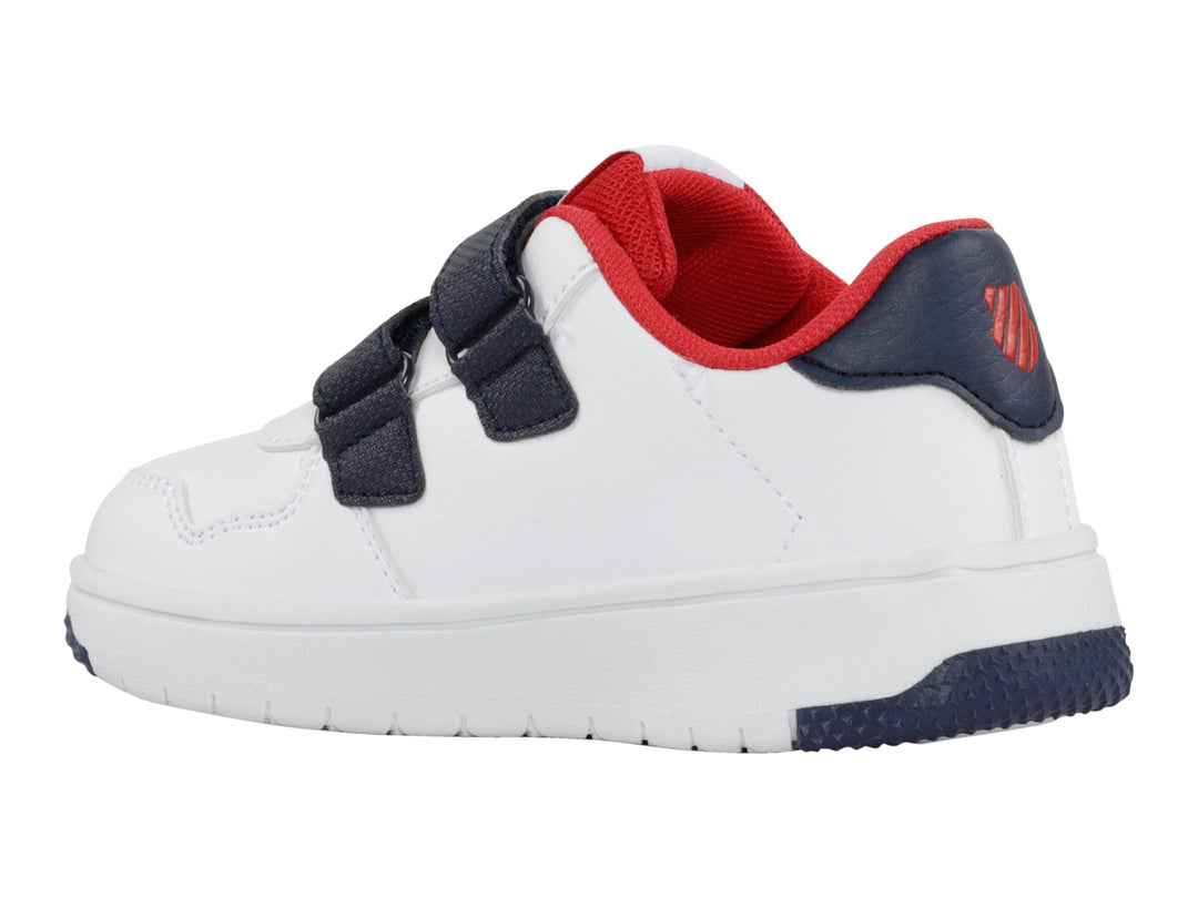 Tenis blancos K-Swiss para niño con cierres de velcro azul marino y detalles en rojo.