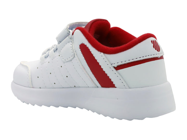 Tenis deportivos K-Swiss para niño en color blanco con detalles en rojo y cierre de velcro.