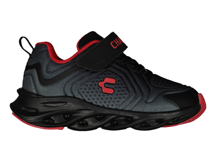 Tenis deportivos Charly color negro con detalles en rojo y cierre de velcro.