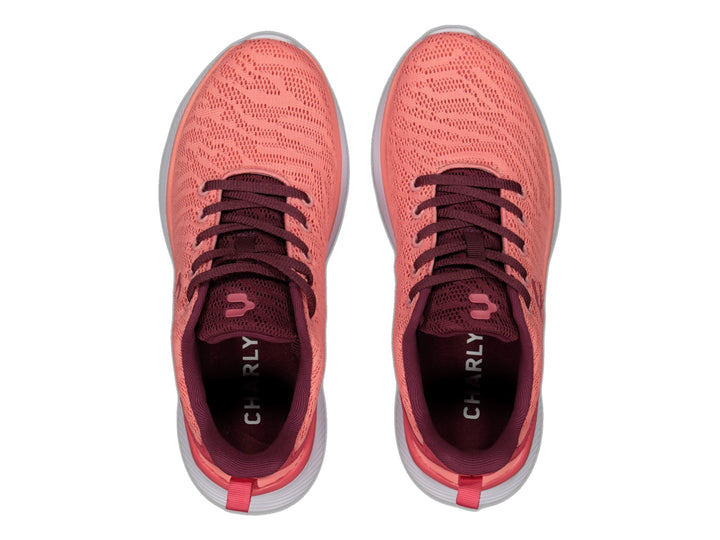 Tenis deportivos Charly color rosa con suela blanca y detalles en guinda.