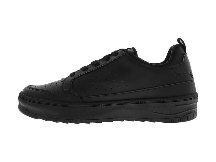 Tenis casuales marca THENTIC en color negro total con suela ancha y detalles perforados en la parte superior.