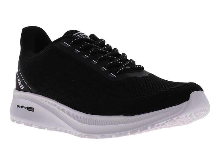 Tenis deportivos marca STARS en color negro con suela blanca y tejido transpirable.