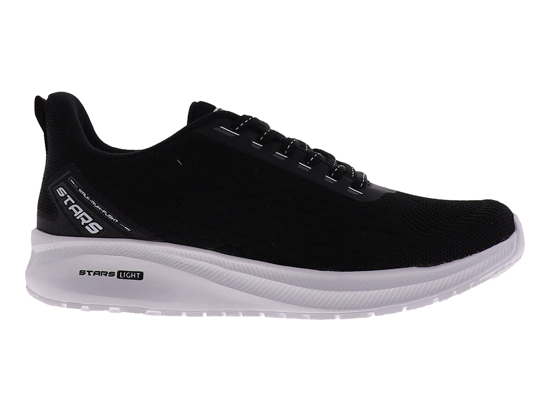Tenis deportivos marca STARS en color negro con suela blanca y tejido transpirable.
